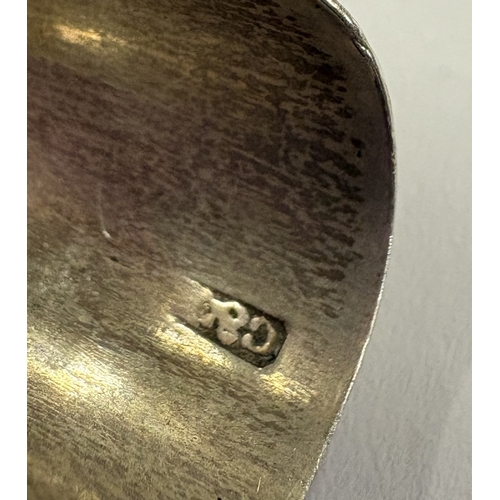 585 - A novelty Victorian silver caddy scoop with green coral handle. Maker's mark only, by Cocks & Bettri... 