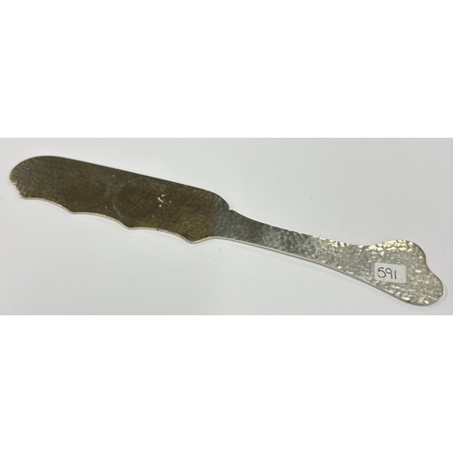 591 - A novelty American silver letter opener inset with five coins. Approx. 70 grams. Est. £200 - £300.