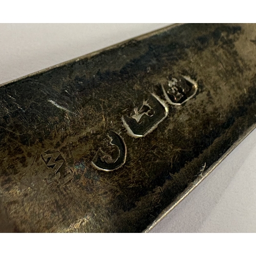 677 - NEWCASTLE: A rare Provincial silver caddy spoon with fluted decoration. Circa 1790. Approx. 12 grams... 