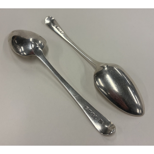 681 - A pair of silver spoons with crested decoration. London 1799. By William Eley I & William Fearn. App... 