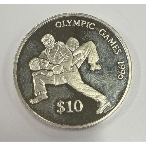 687 - A silver Ten Dollar coin commemorating the 1996 Olympic Games. Fiji 1993. Approx. 28 grams. Est. £60... 