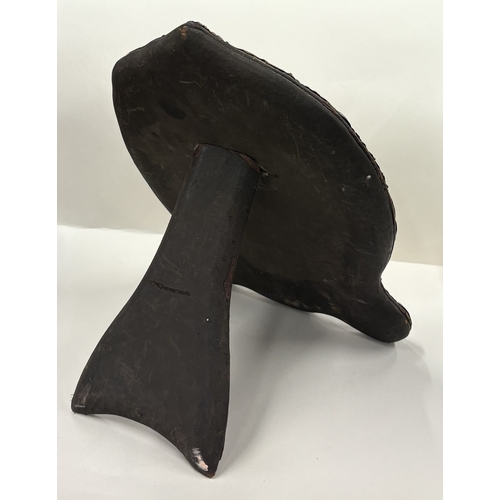 700 - A large heart-shaped silver-mounted mirror profusely decorated with birds and scrolls, with vacant c... 