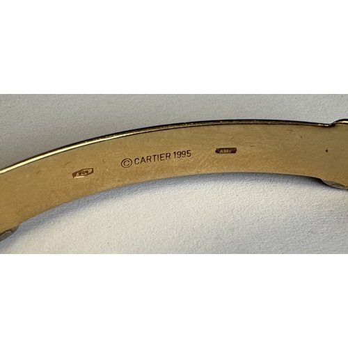 724 - CARTIER: A good 18 carat gold bracelet with concealed clasp complete with box and paperwork. Approx.... 
