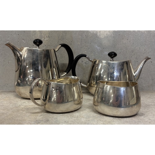 228 - A rare Art Deco silver four-piece tea service. Sheffield 1960. By Walker & Hall. Approx. 2300 grams.... 