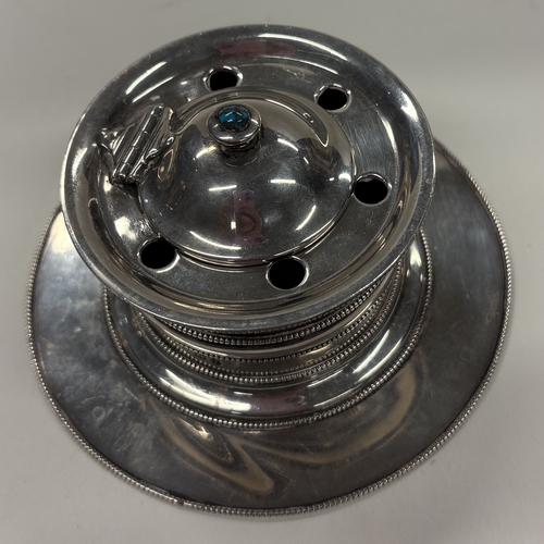 468 - An early 20th Century silver inkwell decorated with a turquoise stone. London 1908. By Liberty & Co.... 