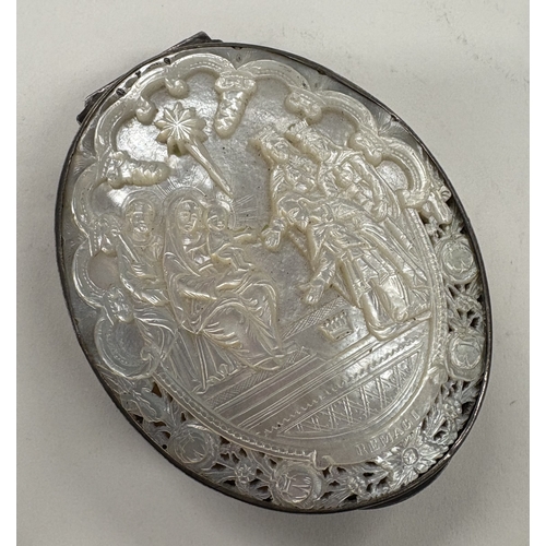 470 - An early 19th Century Dutch silver snuff box with carved MOP decoration to cover. Approx. 179 grams.... 