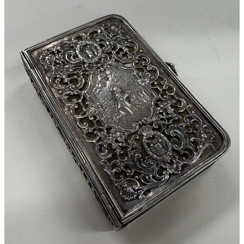 471 - A heavy Antique silver-mounted bible. Est. £400 - £600.