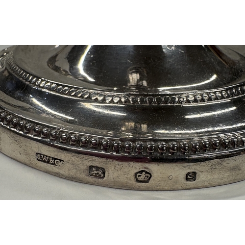 474 - A fine pair of circular 18th Century Georgian cast silver candlesticks with bead decoration. Sheffie... 