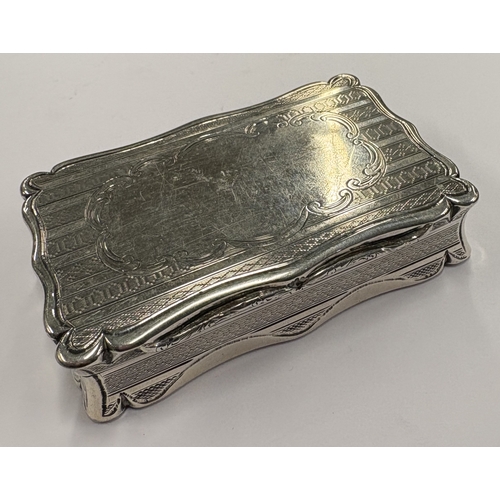 545 - A Victorian silver snuff box with engine-turned decoration. Birmingham 1851. By Edward Smith. Approx... 