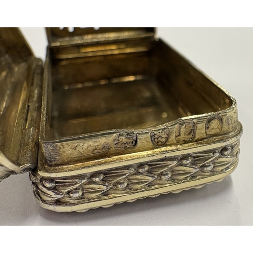 546 - A novelty George III silver vinaigrette chased with bead decoration. London 1806. By William Eley. A... 