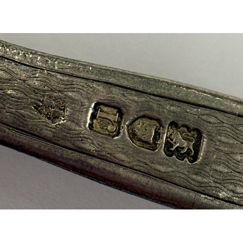 552 - An early 20th Century silver feeding spoon. London 1912. Approx. 26 grams. Est. £60 - £80.