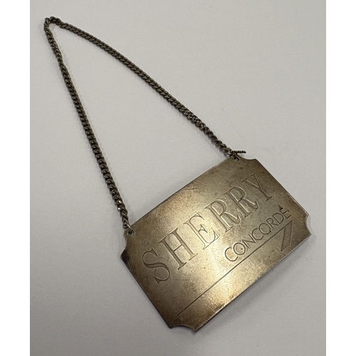 555 - A Concorde silver wine label for 'Sherry'. Birmingham 1986. By British Airways. Approx. 15 grams. Es... 