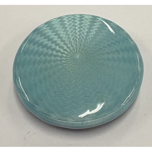 566 - A Continental silver and enamelled compact depicting romantic scene to cover. Approx. 50 grams. Est.... 