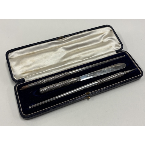 567 - A silver writing set, signed by maker. By Sampson Mordan & Co. Approx. 56 grams. Est. £150 - £200.