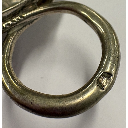 568 - A 19th Century French silver wine taster inset with coin to centre, marked to handle. Approx. 28 gra... 