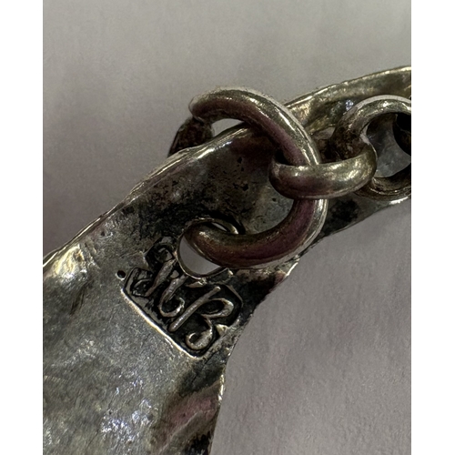 570 - HESTER BATEMAN: A silver decanter label for 'Gin', maker's and lion mark only. Approx. 11 grams. Est... 