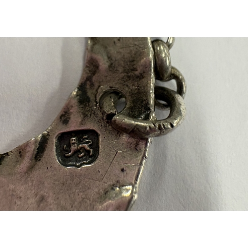 570 - HESTER BATEMAN: A silver decanter label for 'Gin', maker's and lion mark only. Approx. 11 grams. Est... 