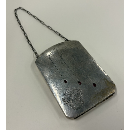 590 - A Continental silver compact decorated with red stones, marked 935 to interior. Approx. 187 grams. E... 
