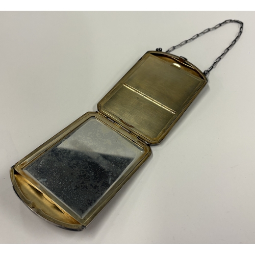 590 - A Continental silver compact decorated with red stones, marked 935 to interior. Approx. 187 grams. E... 