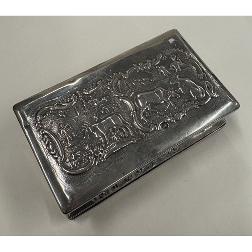 597 - A 19th Century Continental silver table snuff box with embossed decoration. Approx. 194 grams. Est. ... 