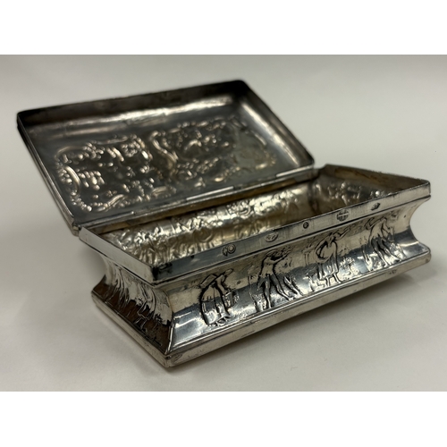 597 - A 19th Century Continental silver table snuff box with embossed decoration. Approx. 194 grams. Est. ... 