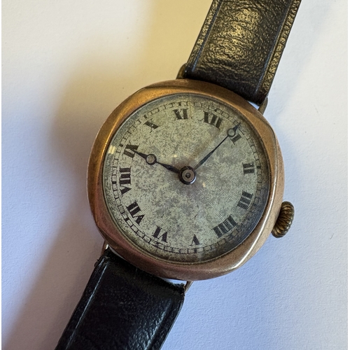741 - A lady's small gold wristwatch with white enamelled dial. Est. £30 - £50.