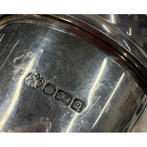 690 - A heavy plain silver cocktail shaker with gilt interior. Sheffield 1996. By Elkington & Co Ltd. Appr... 