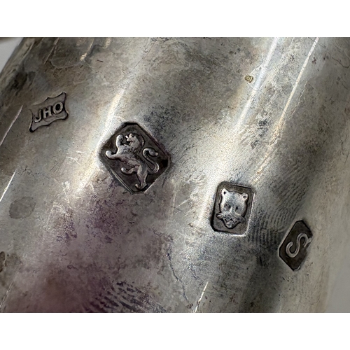 702 - A large pair of tapering silver champagne flutes with gilt interiors. London 1973. By John Henry Ode... 