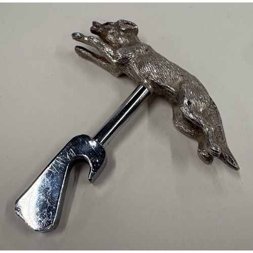704 - An unusual silver bottle opener in the form of a fox with textured body. Birmingham. By J B Chatterl... 