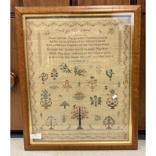 181 - A framed and glazed sampler decorated with flowers. Approx. 32 cms x 40 cms. (ss). Est. £40 - £60.