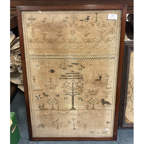 182 - An early framed and glazed sampler decorated with trees and flowers dated 1870. Approx. 34 cms x 42 ... 