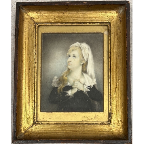 401 - A framed and glazed miniature portrait of a young lady wearing a bonnet and cape. Est. £50 - £80.