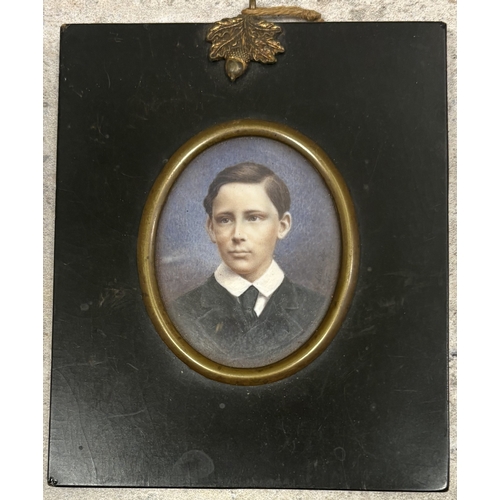 403 - A framed and glazed miniature portrait depicting A H Carrington. Est. £30 - £40.