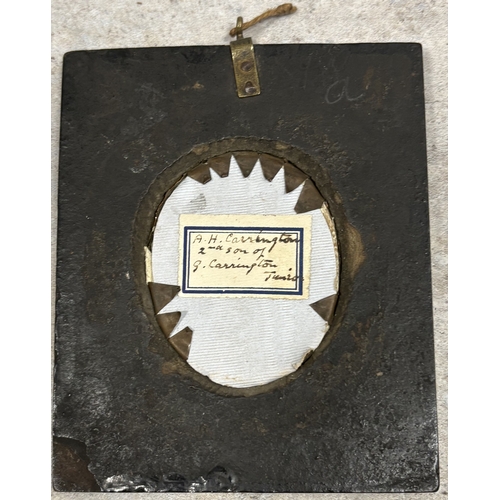 403 - A framed and glazed miniature portrait depicting A H Carrington. Est. £30 - £40.
