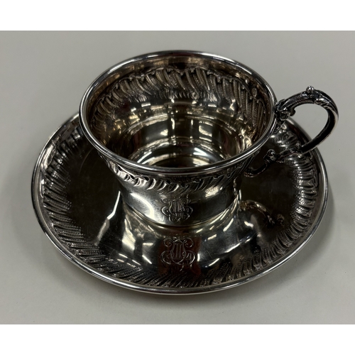 2 - BOULENGER: An attractive French silver teacup and saucer with chased decoration. Approx. 127 grams. ... 