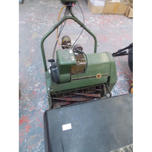 134 - A GREEN VINTAGE WEBB PETROL LAWN MOWER WITH GRASS COLLECTOR