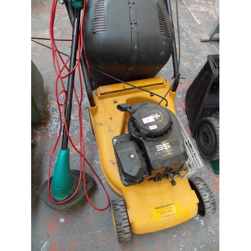 135 - TWO ITEMS - A YELLOW MCCULLOCH PETROL LAWN MOWER WITH GRASS COLLECTOR AND A BRIGGS AND STRATTON ENGI... 