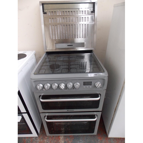152 - A GREY HOTPOINT MULTI FUEL COOKER WITH GAS HOB TWIN OVEN AND FAN WITH AN EXTRACTOR HOOD W/O