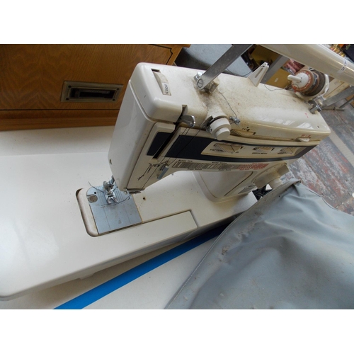 239 - A FINESSE ELECTRIC SEWING MACHINE