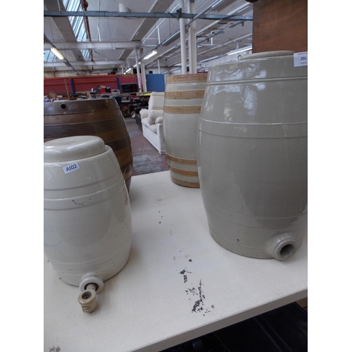 251 - FOUR VINTAGE SALT GLAZED BARRELS