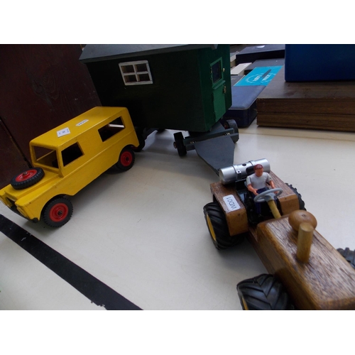 262 - A BESPOKE WOODEN TRACTOR, A WOODEN CARAVAN AND A WOODEN JEEP