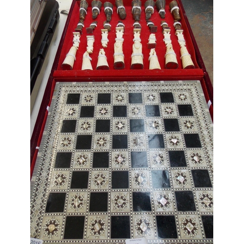 293 - AN EGYPTIAN CHESS SET IN CASE