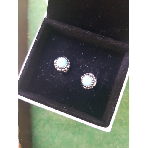 328 - A PAIR OF PANDORA SILVER STUD EARRINGS