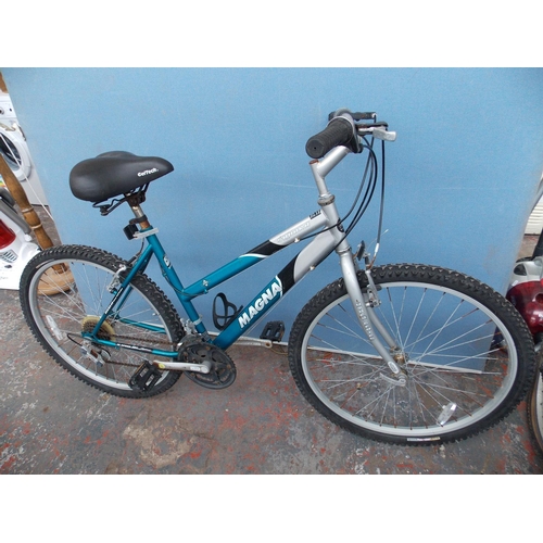 11 - A SILVER AND BLUE MAGNA SAHARA LADIES MOUNTAIN BIKE WITH QUICK RELEASE FRONT WHEEL AND 15 SPEED FALC... 