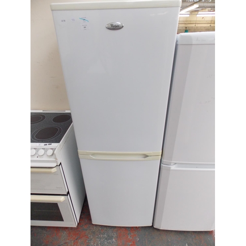 105 - A WHIRLPOOL UPRIGHT FRIDGE FREEZER