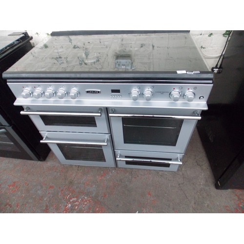 110 - A SILVER LEISUREMASTER 100MM DUAL FUEL RANGE COOKER W/O