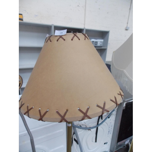144 - A BRASS EFFECT STANDARD LAMP AND SHADE W/O AND A MODERN HALOGEN READING LIGHT