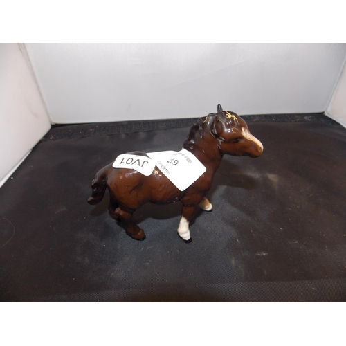 219 - A SMALL ROYAL DOULTON BROWN HORSE