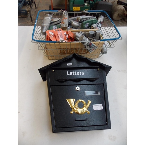 81 - TWO ITEMS - A BASKET CONTAINING SHOE POLISH AND A BLACK METAL LETTER BOX