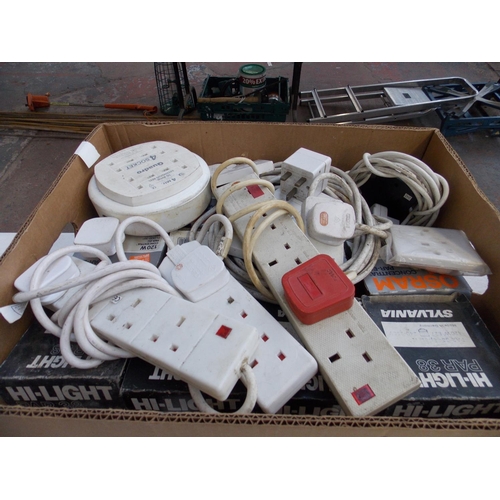 85 - A BOXED OF MIXED ELECTRICALS - EXTENSION LEADS, LIGHT BULBS, MULTI PLUGS ETC